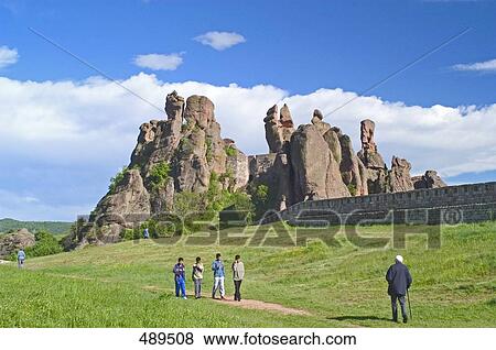 Tourists with castle on hill, Belogradchik Fortress, Belogradchik, Vidin, Romania View Large Photo Image Stock Photo - Tourists with castle on hill, Belogradchik Fortress, Belogradchik, Vidin, Romania . Fotosearch