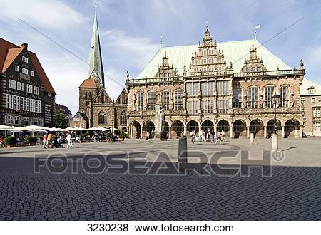 Town hall and church at the market square in Bremen, Germany View Large Photo Image Stock Photo - Town hall and church at the market square in Bremen, Germany . Fotosearch