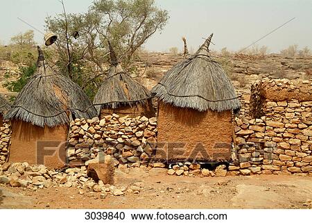 Traditional grain silos at the Dogon village of Bandjagara, Mali View Large Photo Image Stock Image - Traditional grain silos at the Dogon village of Bandjagara, Mali . Fotosearch