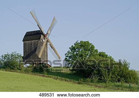 Traditional windmill on grassland, Mecklenburg-Vorpommern, Germany View Large Photo Image Stock Image - Traditional windmill on grassland, Mecklenburg-Vorpommern, Germany . Fotosearch