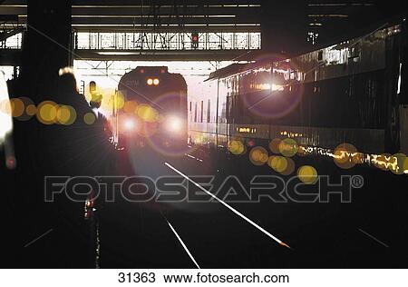 Train approaching at railroad station, Atocha, Madrid, Spain View Large Photo Image Stock Image - Train approaching at railroad station, Atocha, Madrid, Spain . Fotosearch