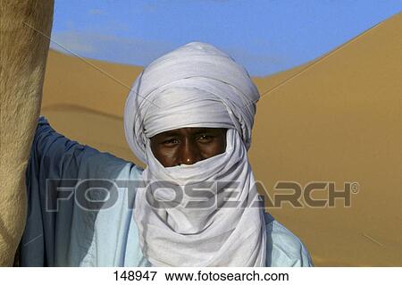 Stock Photo - Tuareg male wearing turban, Tekerkiba, Wadi Al-Hayat, Sahara Desert, Libya . Fotosearch
