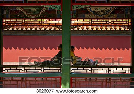 Two people resting at the Summer Palace, Beijing, China View Large Photo Image Stock Photo - Two people resting at the Summer Palace, Beijing, China . Fotosearch