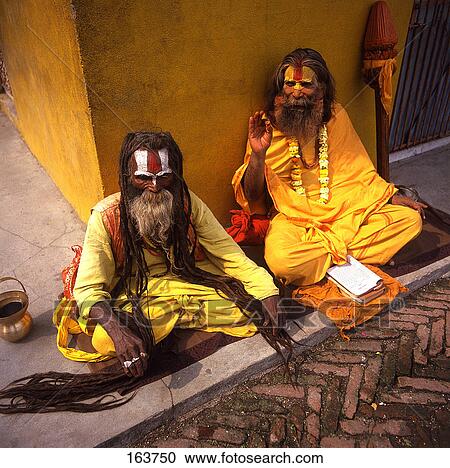 Two sadhu's sitting in front of temple, Pashupatinath, Katmandu, Nepal View Large Photo Image Stock Image - Two sadhu's sitting in front of temple, Pashupatinath, Katmandu, Nepal . Fotosearch