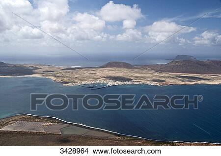 View of La Graciosa, seen from Mirador del Rio, Lanzarote, Spain, bird's eye view View Large Photo Image Picture - View of La Graciosa, seen from Mirador del Rio, Lanzarote, Spain, bird's eye view . Fotosearch