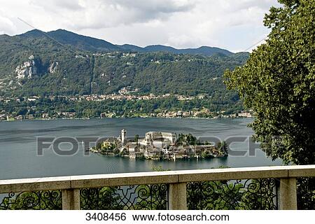 Stock Photograph - View of Lago d Orta and Isola San Giulio, Piedmont, Italy, elevated view . Fotosearch