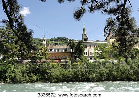 View of Meran, river in the foreground, Italy View Large Photo Image Stock Image - View of Meran, river in the foreground, Italy . Fotosearch