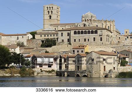 Stock Photograph - View of the oil mills and the old town of Zamora, Spain . Fotosearch
