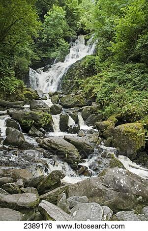 Water flowing on rocks, Iveragh Peninsula, County Kerry, Munster, Ireland View Large Photo Image Stock Photograph - Water flowing on rocks, Iveragh Peninsula, County Kerry, Munster, Ireland . Fotosearch