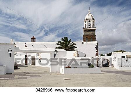 Stock Photograph - White buildings and San Miguel Church, Teguise, Lanzarote, Spain . Fotosearch