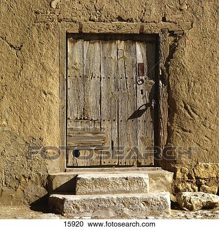 Wooden door of adobe house, Mota del Marques, Valladolid, Castilla y Leon, Spain View Large Photo Image Stock Image - Wooden door of adobe house, Mota del Marques, Valladolid, Castilla y Leon, Spain . Fotosearch
