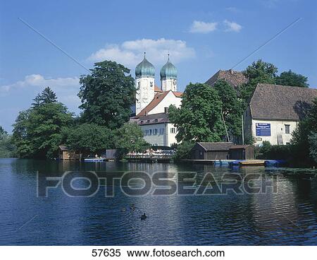 Stock Photography - Abbey at waterfront, Seeon Abbey, Bavaria, Germany . Fotosearch