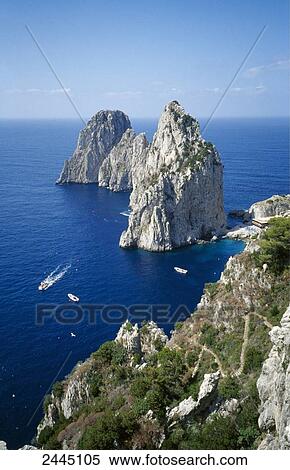 Aerial view of boats in sea, Faraglioni, Capri Island, Campania, Italy View Large Photo Image Stock Photography - Aerial view of boats in sea, Faraglioni, Capri Island, Campania, Italy . Fotosearch