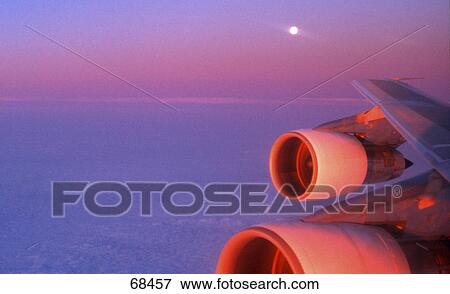 Airplane in flight View Large Photo Image Stock Photo - Airplane in flight . Fotosearch