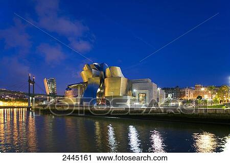 Art museum lit up at dusk, Guggenheim Museum, Bilbao, Spain View Large Photo Image Stock Image - Art museum lit up at dusk, Guggenheim Museum, Bilbao, Spain . Fotosearch