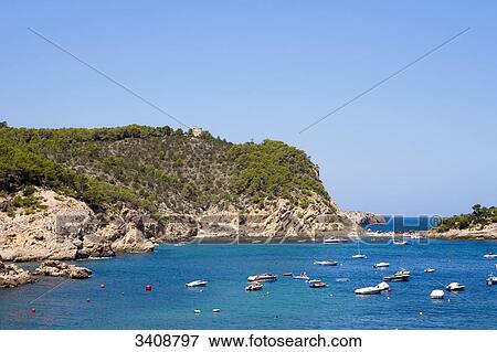 Stock Photo - Bay of Puerto de San Miguel, Ibiza, Spain, elevated view . Fotosearch