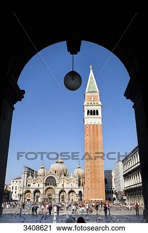 Stock Image - Bell Tower seen through an arch, St. Marcus Square, Venice, Italy . Fotosearch