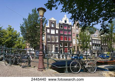 Bicycles leaning against railing, Reguliersgracht, Amsterdam, Netherlands View Large Photo Image Stock Image - Bicycles leaning against railing, Reguliersgracht, Amsterdam, Netherlands . Fotosearch