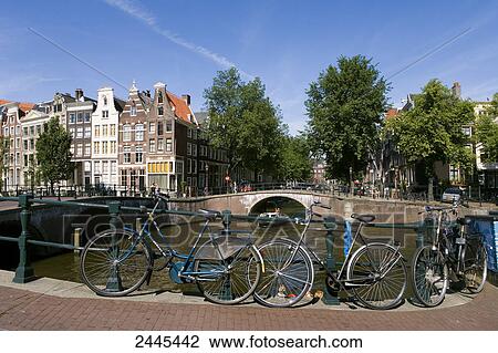 Bicycles leaning against railing, Leidsegracht, Herengracht, Amsterdam, Netherlands View Large Photo Image Stock Image - Bicycles leaning against railing, Leidsegracht, Herengracht, Amsterdam, Netherlands . Fotosearch