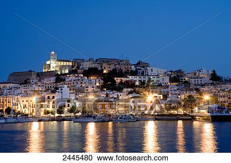 Stock Image - Boats at harbor, Dalt Vila, Ibiza, Balearic Islands, Spain . Fotosearch