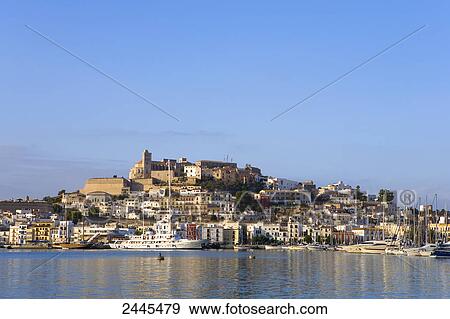 Boats at harbor, Dalt Vila, Ibiza, Balearic Islands, Spain View Large Photo Image Stock Photo - Boats at harbor, Dalt Vila, Ibiza, Balearic Islands, Spain . Fotosearch