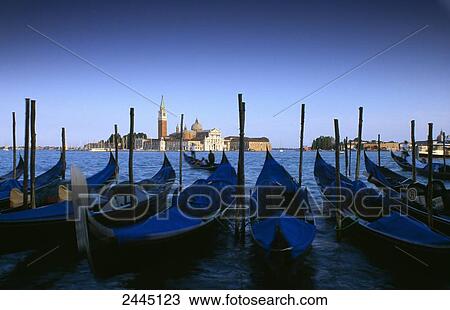 Stock Image - Boats at harbor, San Giorgio Maggiore, Bacino Di San Marco, Venice, Italy . Fotosearch