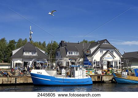 Boats at harbor, Vitte Beach, Hiddensee Island, Mecklenburg-West Pomerania, Germany View Large Photo Image Stock Photography - Boats at harbor, Vitte Beach, Hiddensee Island, Mecklenburg-West Pomerania, Germany . Fotosearch