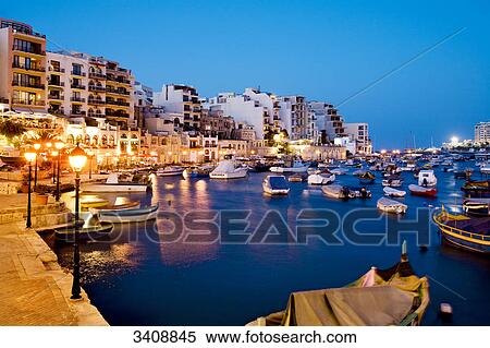 Boats in a harbour, Spinola Bay, St. Julians, Malta View Large Photo Image Stock Photography - Boats in a harbour, Spinola Bay, St. Julians, Malta . Fotosearch