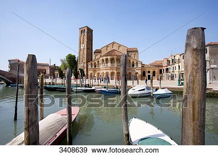 Boats on a canal, Basilika di Santa Maria e Donato in the background, Murano, Venetia, Italy  View Large Photo Image Stock Photo - Boats on a canal, Basilika di Santa Maria e Donato in the background, Murano, Venetia, Italy . Fotosearch