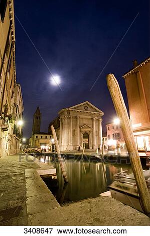 Boats on a canal in Venice at night, Italy View Large Photo Image Stock Photo - Boats on a canal in Venice at night, Italy . Fotosearch