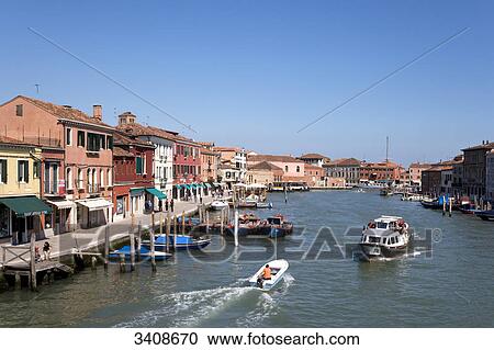 Stock Image - Boats on the Canal Grande, Murano, Italy, elevated view . Fotosearch
