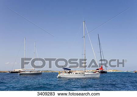 Stock Image - Boats on the sea, Formentera, Balearic Islands, Spain . Fotosearch