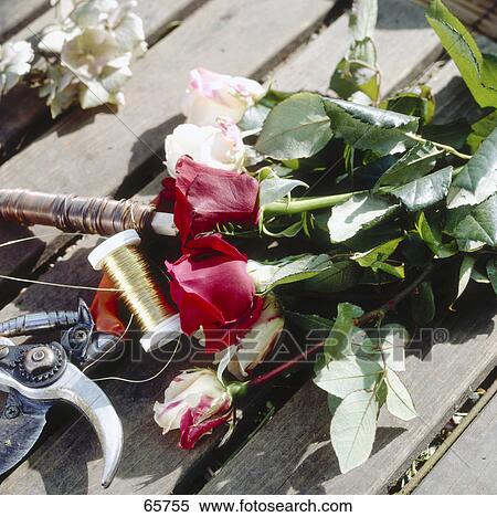 Stock Photography - Bouquet preparing objects on wooden planks . Fotosearch