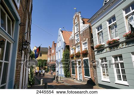 Buildings along street in town, Leer, East Frisian Islands, Lower Saxony, Germany View Large Photo Image Picture - Buildings along street in town, Leer, East Frisian Islands, Lower Saxony, Germany . Fotosearch