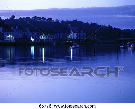 Stock Photograph - Buildings at waterfront, Audierne, Finistere, Brittany, France . Fotosearch