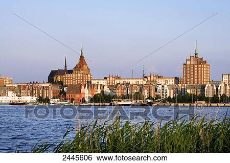 Stock Photograph - Buildings at waterfront, Rostock, Mecklenburg-West Pomerania, Germany . Fotosearch