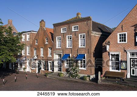 Buildings in town, Greetsie, Lower Saxony, Germany View Large Photo Image Stock Photo - Buildings in town, Greetsie, Lower Saxony, Germany . Fotosearch