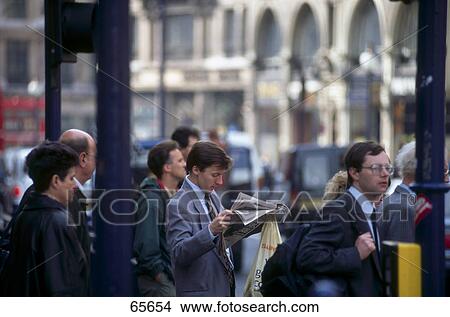 Businesspeople waiting in street, Regent Street, London, England View Large Photo Image Picture - Businesspeople waiting in street, Regent Street, London, England . Fotosearch