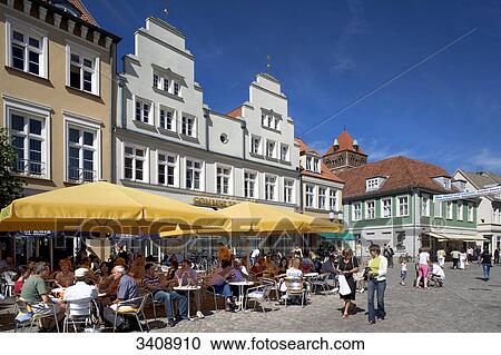 Cafe at the market square of Greifswald, Germany View Large Photo Image Stock Image - Cafe at the market square of Greifswald, Germany . Fotosearch