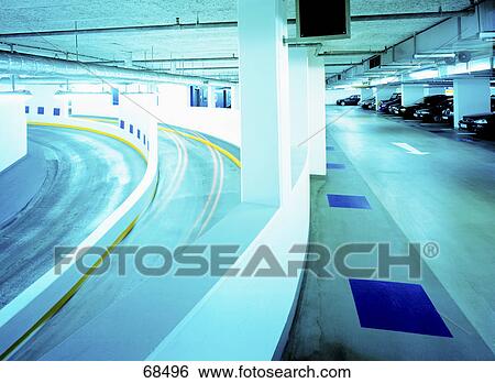 Stock Photograph - Cars parked in parking lot . Fotosearch
