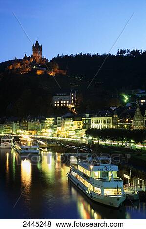 Castle lit up at dusk, Reichsburg Castle, Mosel Valley, Cochem, Rhineland-Palatinate, Germany View Large Photo Image Stock Photo - Castle lit up at dusk, Reichsburg Castle, Mosel Valley, Cochem, Rhineland-Palatinate, Germany . Fotosearch
