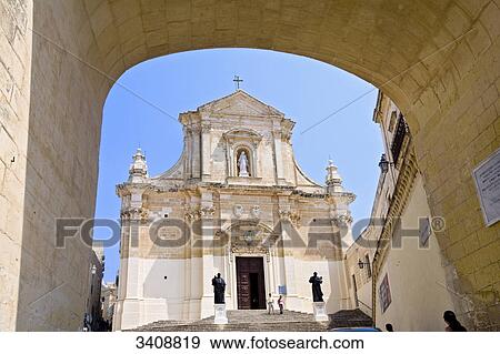 Cathedral in Victoria seen through an arch, Gozo, Malta, low angle view View Large Photo Image Stock Photo - Cathedral in Victoria seen through an arch, Gozo, Malta, low angle view . Fotosearch