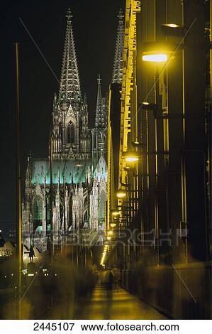 Stock Photo - Cathedral lit up at night, Cologne Cathedral, Cologne, Rhineland, North Rhine-Westphalia, Germany . Fotosearch