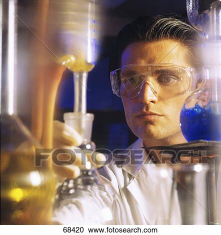 Chemist in laboratory View Large Photo Image Stock Image - Chemist in laboratory . Fotosearch