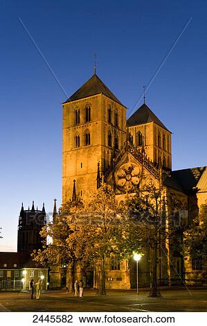 Stock Image - Church lit up at night, St Paul Church, Muenster, North Rhine-Westphalia, Germany . Fotosearch