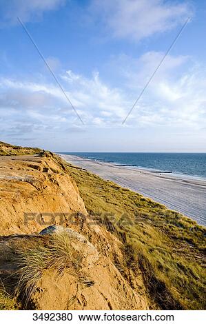 Stock Image - Cliff (Rotes Kliff) at the western coast of Sylt, Germany, elevated view . Fotosearch