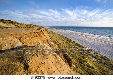 Cliff (Rotes Kliff) at the western coast of Sylt, Germany, elevated view View Large Photo Image Stock Photo - Cliff (Rotes Kliff) at the western coast of Sylt, Germany, elevated view . Fotosearch
