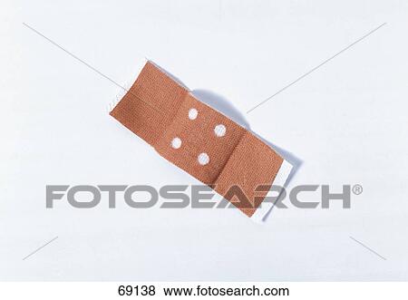 Stock Photo - Close-up of adhesive bandage . Fotosearch