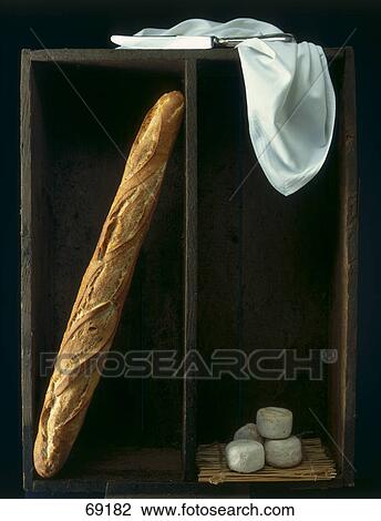 Close-up of baguette and cheese View Large Photo Image Stock Image - Close-up of baguette and cheese . Fotosearch