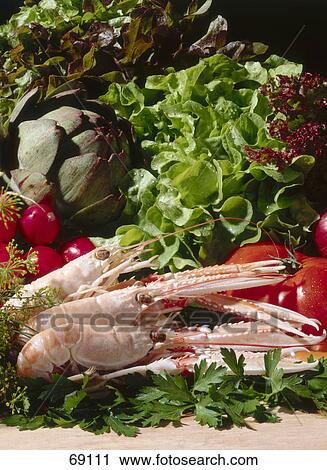 Stock Image - Close-up of dead crawfish and vegetables . Fotosearch